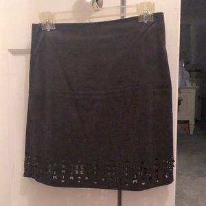 Black suede like mini skirt with cutout designs